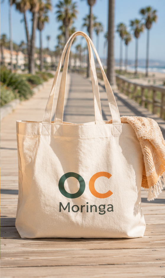 OC Moringa Canvas Beach Tote on the beach at golden hour